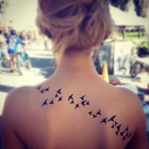 Flying birds cute tattoo for girls