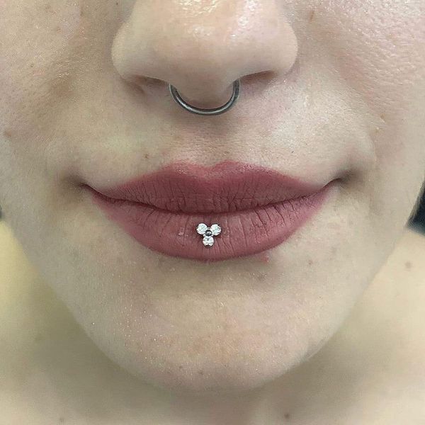 Ashley Piercing has a perforation on the center of the lower lip