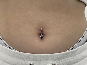 belly button piercing healing time