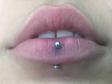 below lip piercing