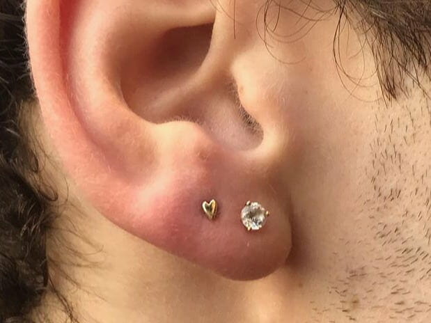 boys ear lobe piercing