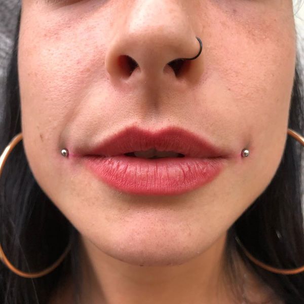 dahlia bites lip piercing
