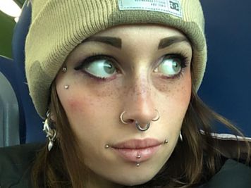 dahlia piercing and double nostril