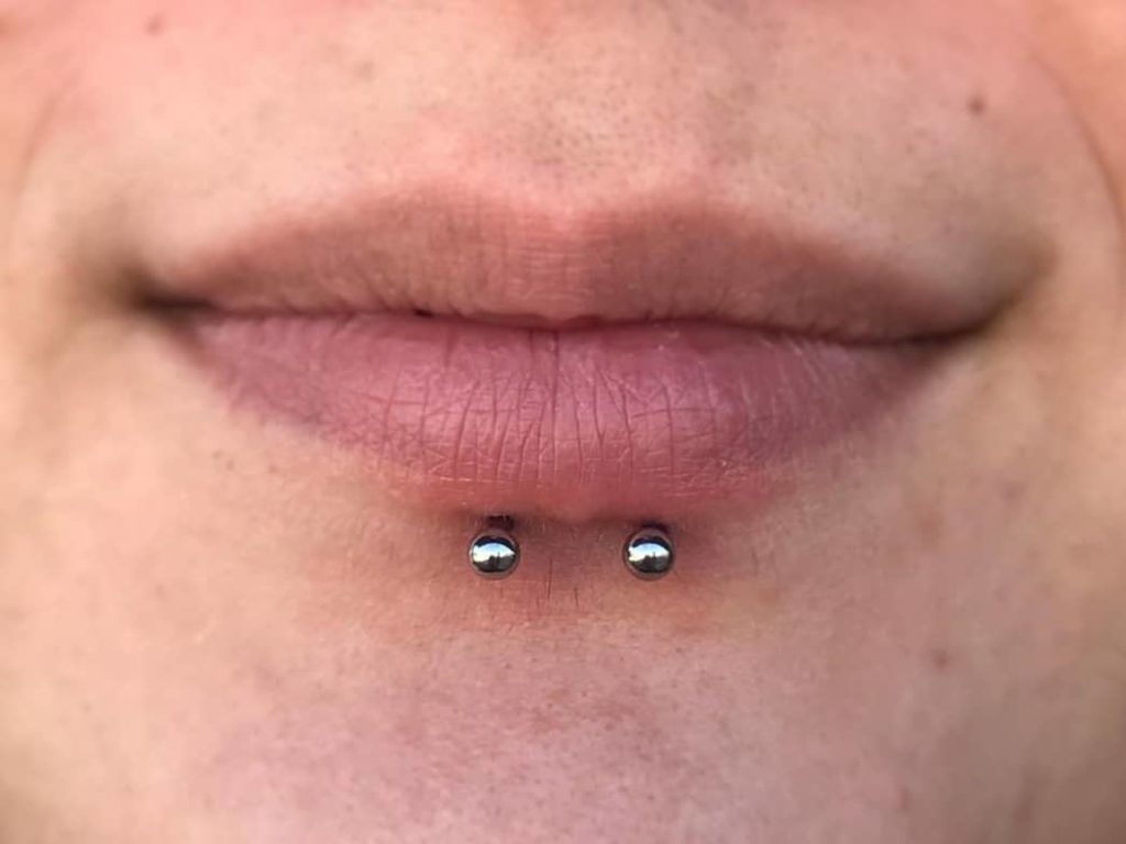 dolphin bites on lips