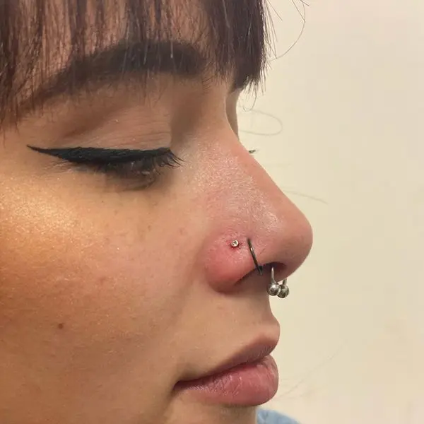 double hoop nose piercing