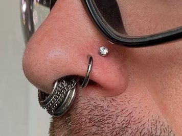 double nose piercing septum men