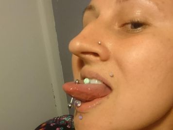 double surface tongue piercing
