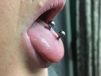 double tongue piercing bars