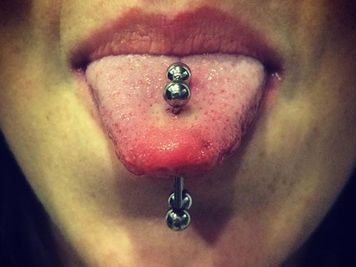 double tongue piercing image