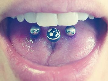 double tongue piercing three barbells