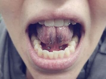 double tongue web piercing