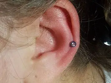 ear auricle piercing