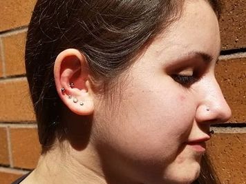 earlobe and snug piercing