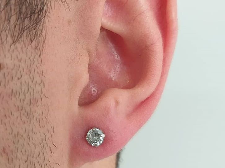 earlobe piercing healing time