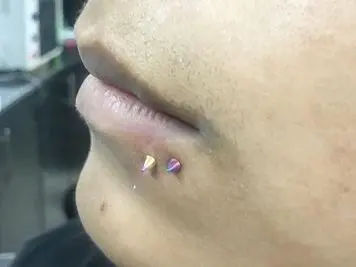 fake spider bite piercing