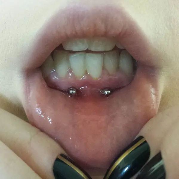 frowny smiley piercing