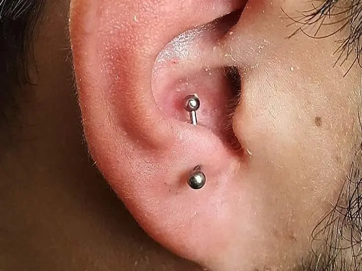 guy with anti tragus piercing