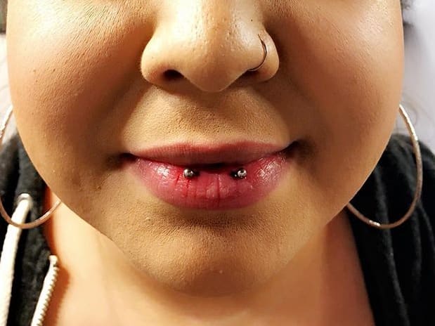 horizontal lip piercing cost