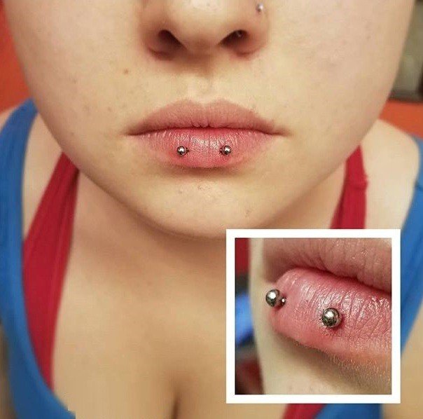 horizontal lip piercing image