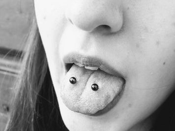 images of frog eyes tongue piercing