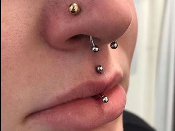 jestrum piercing and nostril septum