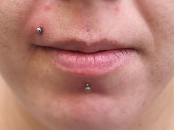 labret and madonna piercing