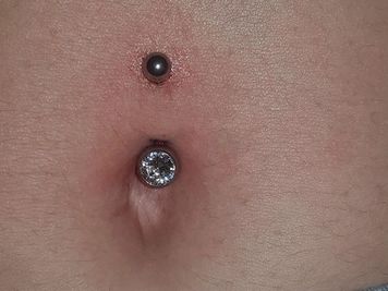 male belly button piercing