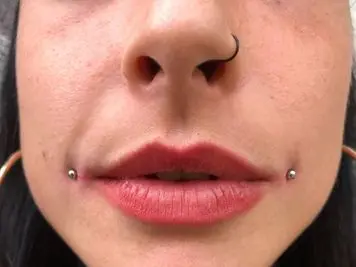 nostril and dahlia piercing