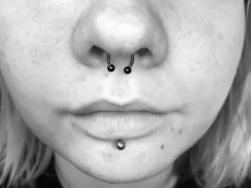 septum and labret piercing
