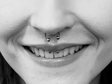 septum and smiley piercing