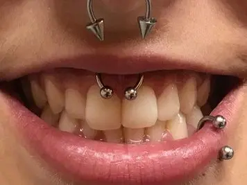 smiley and septum piercing