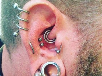 spiral ear piercing men