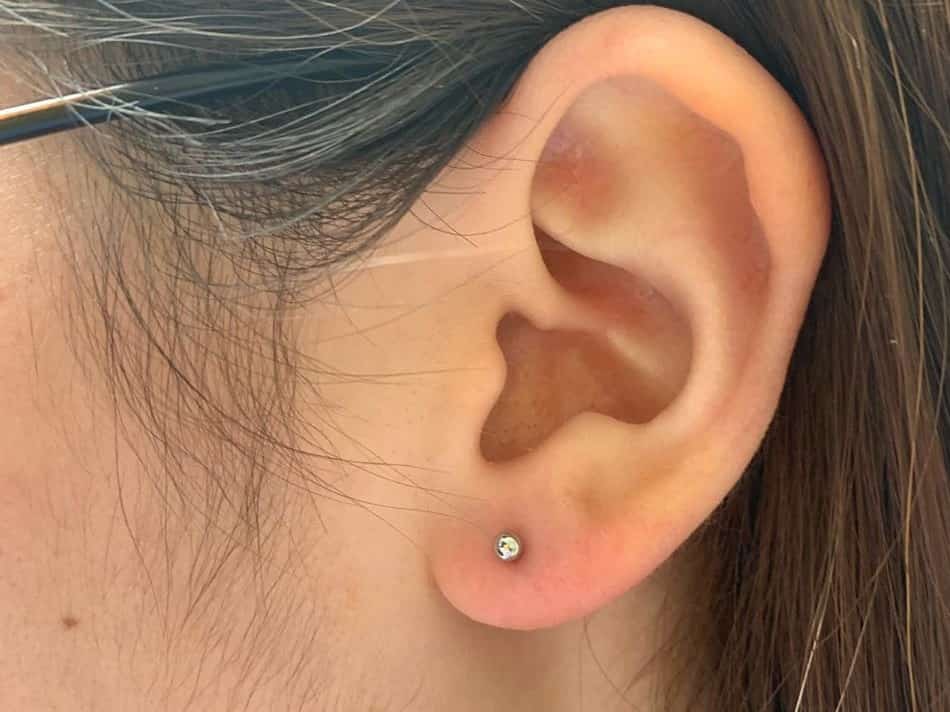 tiny ear lobe piercing