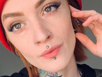 tiny medusa piercing and labret