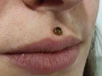 tiny philtrum piercing