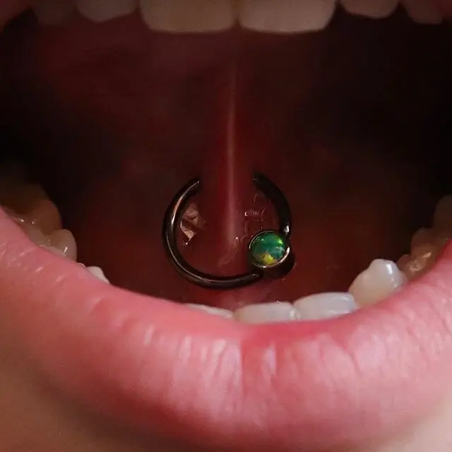 tongue web piercing
