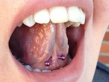 tongue web piercing pain