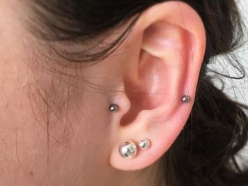tragus with auricle piercing