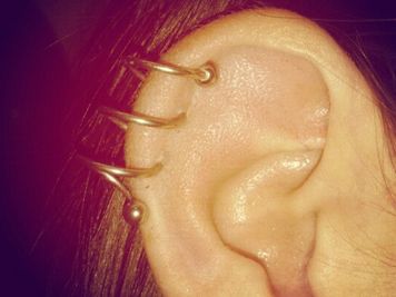 triple spiral ear piercing