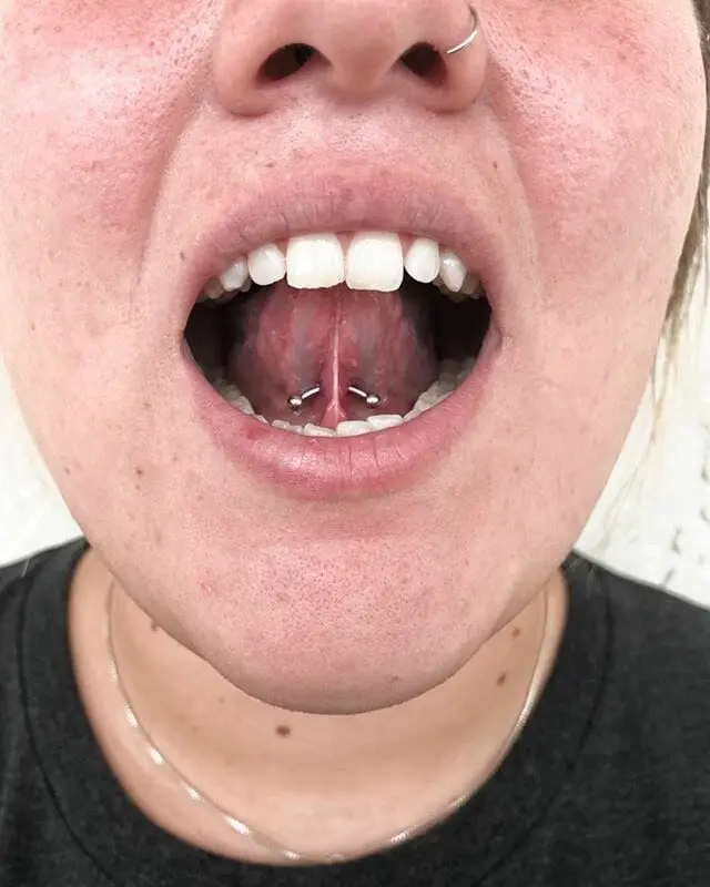 under tongue piercing