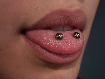 venom tongue piercing image